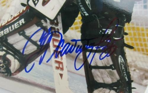 Николај Кабибулин потпиша автоматски автограм 8x10 Фото II - автограмирани фотографии од НХЛ