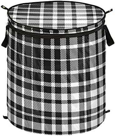 Карирано црно бело појавување на алишта за перење со капаци за преклопување на капакот за складирање на капакот за пикник за патувања во стан