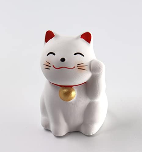 Јапонија среќна мачка Манеки Неко ја повикува мачката бела лева лева боја омикуџи, јапонско богатство, се лизга фенгшуи, среќа со среќа мачки