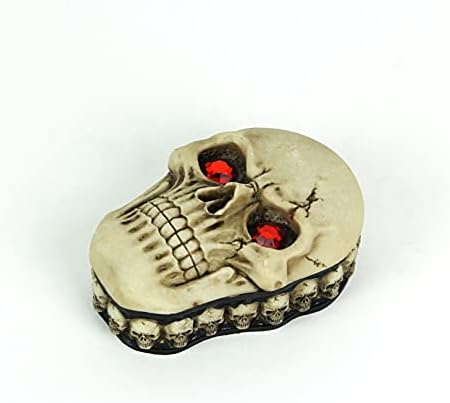 Гаден човечки череп кутија со ливчиња со накит со накит со црвени очи