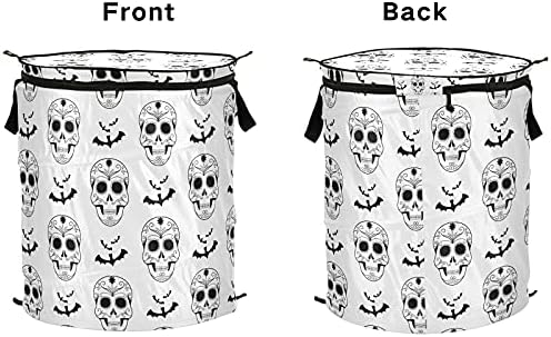 Ноќта на вештерките Страшни черепи се појавуваат на алишта за перење со капакот за складирање на капакот за склопување на торбички