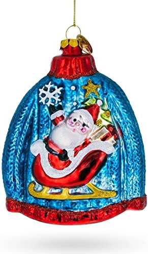 Синиот Божиќен џемпер со Божиќниот украс Дедо Мраз